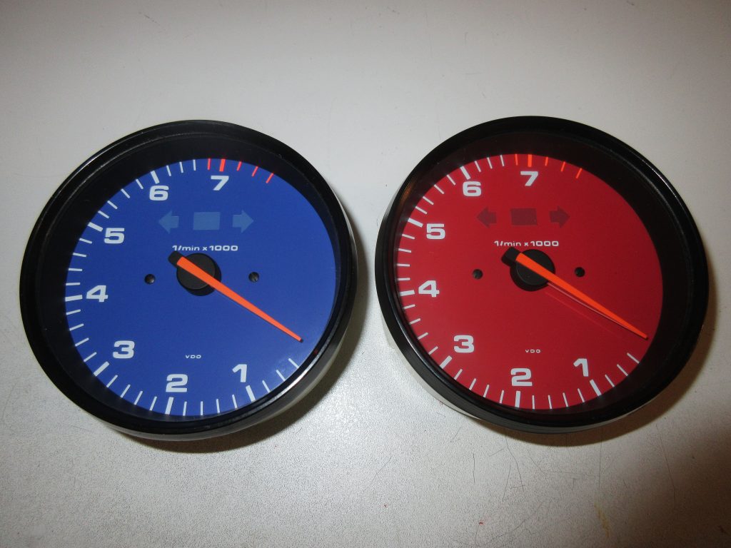 Blue and Red Porsche Rev Counters