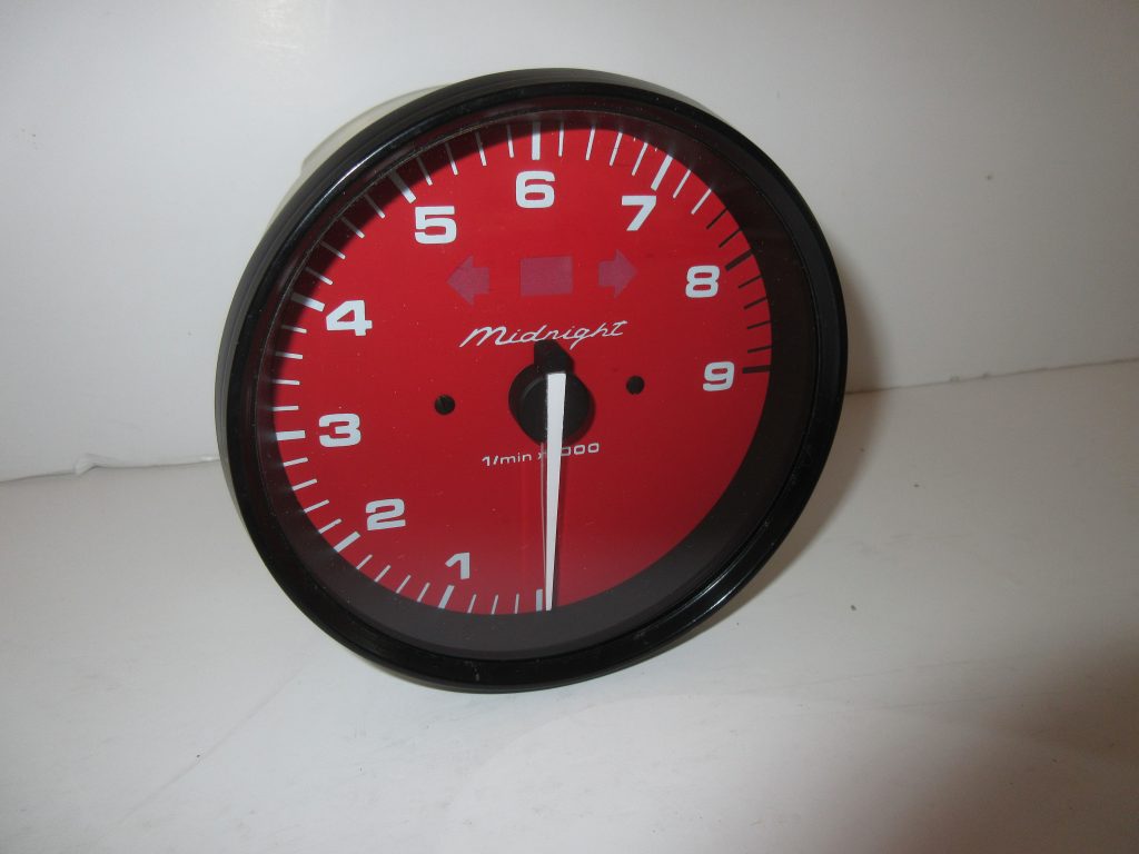 Porsche Tachometer with Red Face and White Numbers